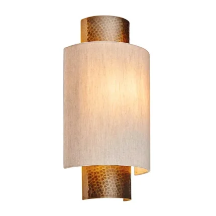 Wall light in aged bronze finish with natural fabric shade