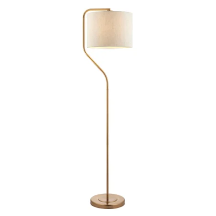 Floor lamp in brushed aged brass finish with natural linen fabric shade