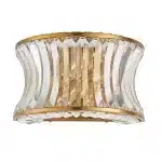 Wall light in brushed warm brass finish with clear glass