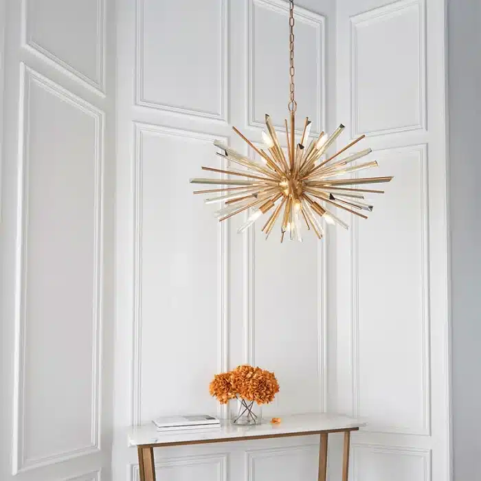 Large antique brass plated pendant light in starburst design for sitting room. living room and hallway