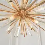 Large antique brass plated pendant light in starburst design for sitting room. living room and hallway