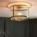 Flush ceiling pendant light in antique brass finish lifestyle image