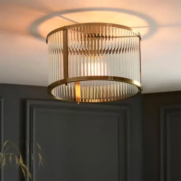 Flush ceiling pendant light in antique brass finish lifestyle image