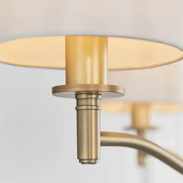 Matt antique brass pendant light with vintage white shades bulbholder detailing