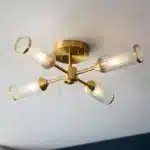 Semi flush satin brass ceiling light ribbed glass shade lifestyle